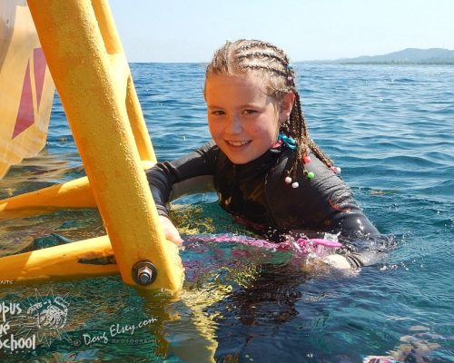 Child taking the PADI Bubblemaker course in Roatan, Honduras